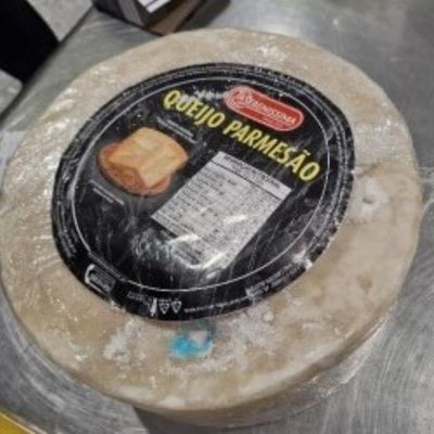 Woman jailed after trying to smuggle £800k of cocaine in Parmesan cheese at Heathrow Airport