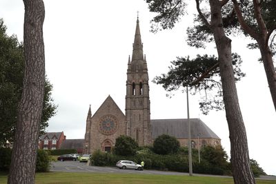 Man in court over murder of Stephen Brannigan and attack on priest in church
