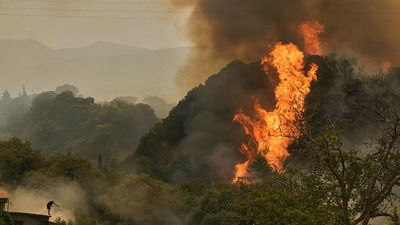 At least three killed as European wildfires threaten the evacuation of thousands