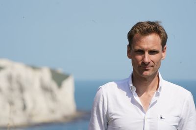 Shadow Home secretary Chris Philp has 'curved machete' pulled on him during visit to French migrant camp