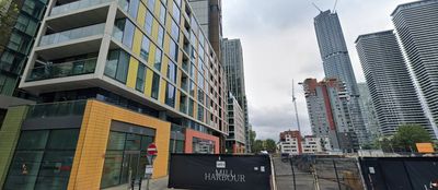 Woman in her 20s plunges to death from building in Canary Wharf