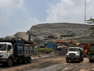 New Delhi’s garbage mountains become heat bombs for India’s waste pickers