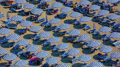 Amid blistering heatwaves, Italians are abandoning their beloved beach holidays for the mountains
