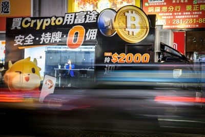 Asian Markets Mixed As Bitcoin Surges To New High