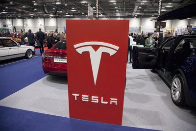 Tesla’s Pennant Just Snapped: Here’s What It Means for the Stock