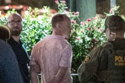 Suspect who admitted to hurling sandwich at DC cops on the street revealed to be a Justice Department employee