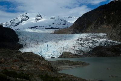 Temporary barriers spared Alaska's capital from severe flooding. A long-term solution is elusive