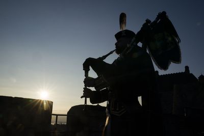 Lone piper plays at Edinburgh Castle to mark 80th anniversary of VJ Day