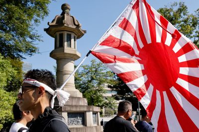 Japan minister visits controversial shrine to mark World War II anniversary