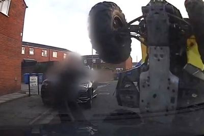 Man flips quad bike over police car, narrowly missing officer