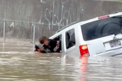 Dramatic rescue as woman pulled from car in Tennessee floodwaters