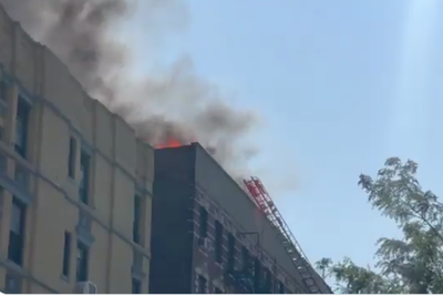 Parts of Manhattan covered in black smoke after apartment fire leads to massive emergency response