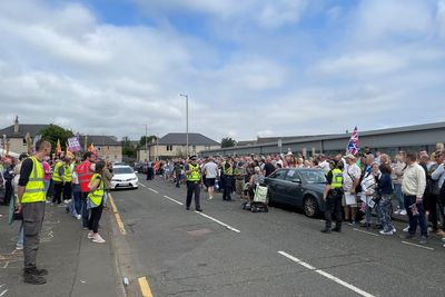 Anti-racism demonstrators stage counter-protest outside asylum seekers hotel