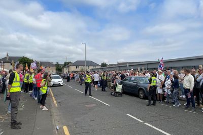 Anti-racism demonstrators square off against protesters shouting ‘send them home’ outside asylum hotel