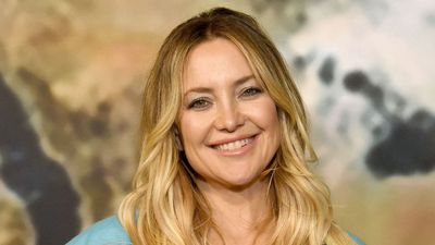 Kate Hudson just solved my patio furniture dilemma with this perfect white-and-wood chair – it's proof that classics always win