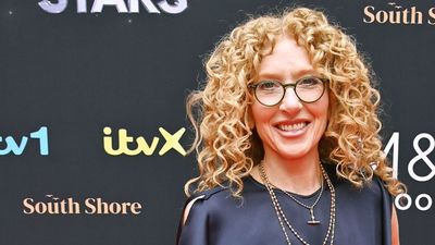 Looking for a chic alternative to your LBD? Kelly Hoppen's midnight blue dress and trainers combo is worth trying