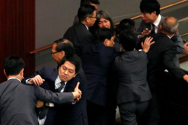 Hong Kong democracy activist granted asylum after fleeing to Australia