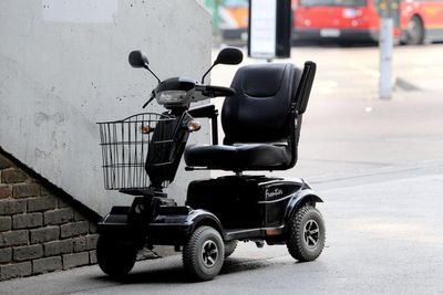 Man in his 70s arrested after mobility scooter driver allegedly punched in head