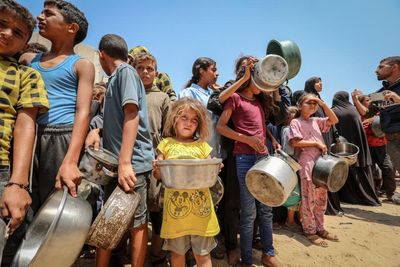 Israeli military preparing to expel Gaza City residents as baby in tent among those killed in latest attacks