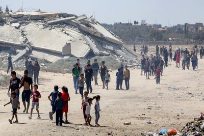 At least 57 Palestinians killed as Israel escalates attack on last major population centre in Gaza City