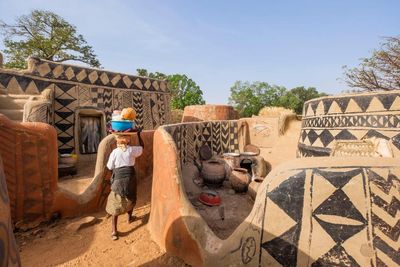Climate crisis harming world heritage painted houses in Burkina Faso, say residents