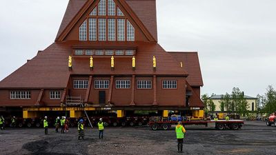 Historic Swedish church transported on trailers to avoid being swallowed by mine