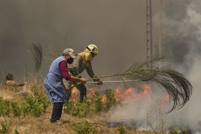 Spain battles major fires even as heatwave eases with lower temperatures