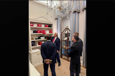 Trump shows off merch teasing third term as Zelensky visits seeking end to Ukraine war: ‘Exit through the gift shop’