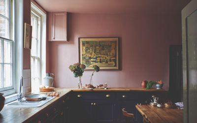 Bye bye beige kitchen walls – experts say 'it tries so hard to be inoffensive it becomes forgettable' so these are the 4 more exciting shades to use instead