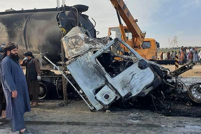 At least 71 Afghan refugees killed in huge bus crash after being deported by Iran