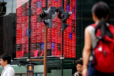 Asian Markets Waver As Japan Exports Show Tariff Strain