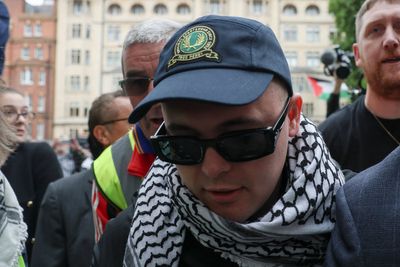 Kneecap rapper faces wait over whether terror charge is thrown out