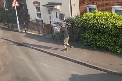 Horrific moment man 'hunted down' police with crossbow after stabbing neighbour