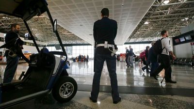 Passengers evacuated from Italian airport after 'lunatic' sets fire to check-in desks