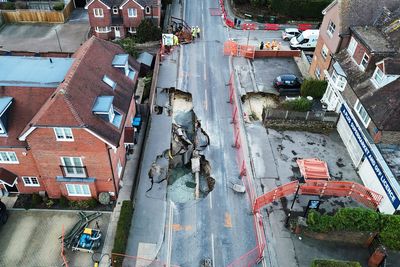 Mystery of massive sinkhole that engulfed Surrey street closer to being solved