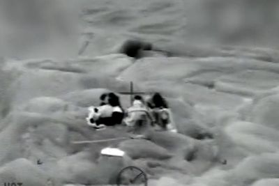 Four young sisters rescued from rock in Lake Superior after getting stranded while paddle-boarding