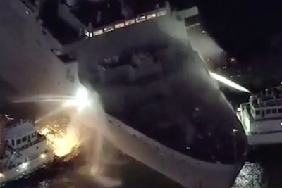 US Navy ship erupts in flames near Japan