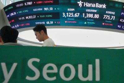 Asian shares are mostly higher after a mixed finish on Wall Street
