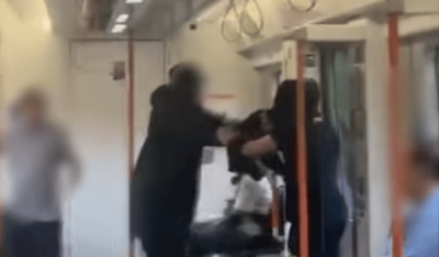 Mother 'sickened' after autistic schoolboy 'beaten up by man on London train'