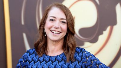 With a single chartreuse rug, Alyson Hannigan shows exactly how to elevate a green living room without overwhelming the space