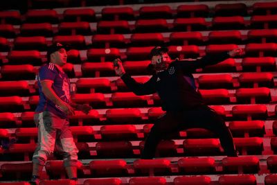 South American football match abandoned after shocking scenes of fan violence