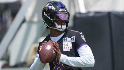 Lamar Jackson Misses Ravens' Practice One Day After Exiting With Injury