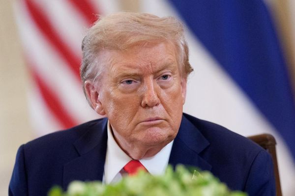 Trump visits DC police station and boasts of success of crime crackdown