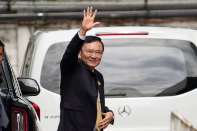 Former Thai Prime Minister Thaksin Shinawatra says he has been acquitted of royal defamation