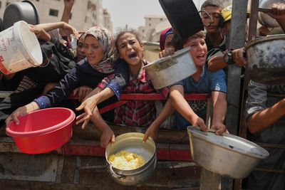 Famine confirmed in Gaza City for first time amid warnings it will extend
