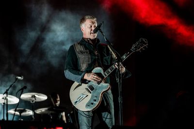Queens Of The Stone Age headline festival rocked by controversy