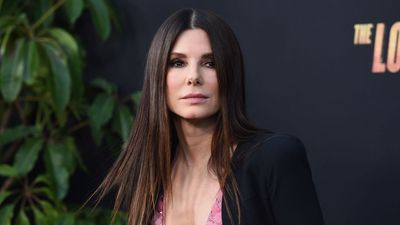 Sandra Bullock's floral midi is the dress that will see you through late summer days and long into next season
