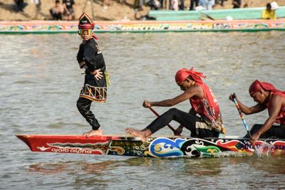 Indonesian Child's Viral Fame Draws Tourists To Boat Race
