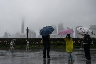 Vietnam and China evacuate hundreds of thousands as Typhoon Kajiki nears