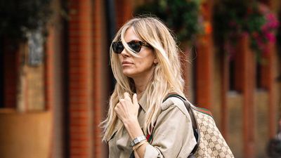 Sienna Miller's classic shirt and jeans outfit is perfect for autumn - and her bold accessories make it all the more stylish